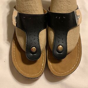 Ladies Size 39/8 solid black sandals with gold buckle detail